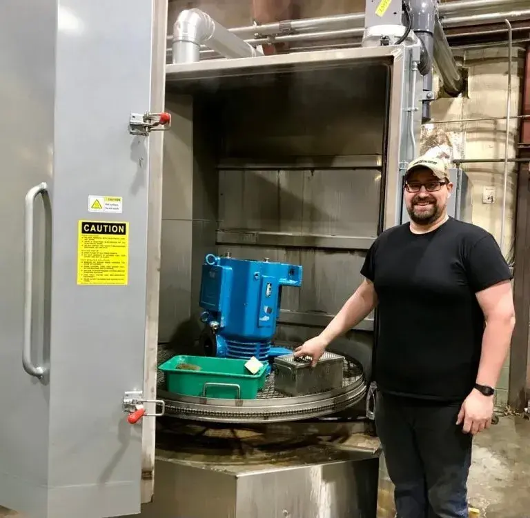 Geiger Service Technician in front of a repair job